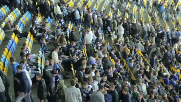 Football fans leave arena after match — Stock Video