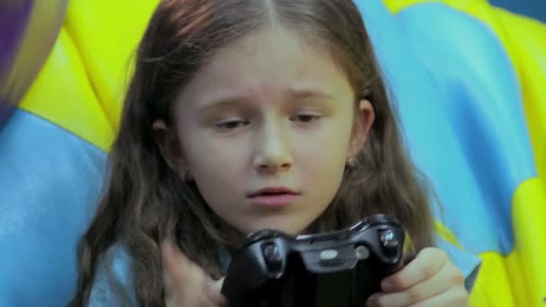 Excited girl playing console game — Stock Video