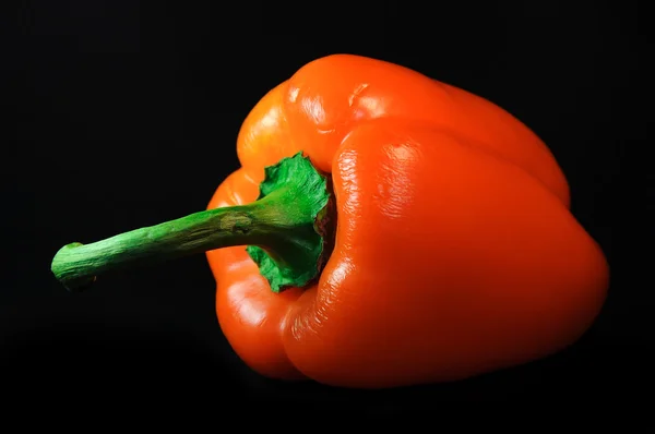 Sweet peppers on black background — Stock Photo, Image