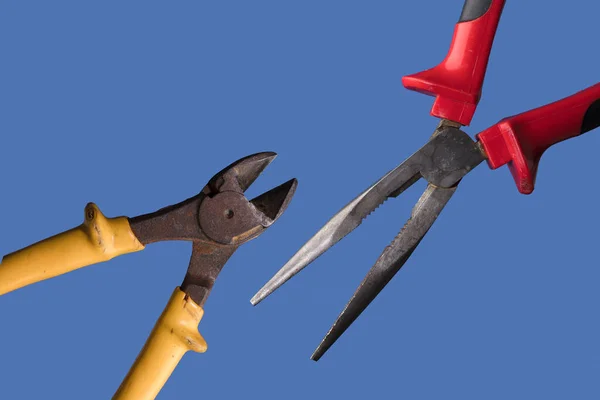 different cutting pliers, with blue background