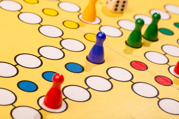 Game pawns on a board — Stock Photo, Image