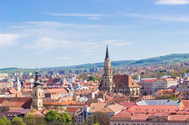Scenic view of Cluj-Napoca under blue sky, Romania clipart