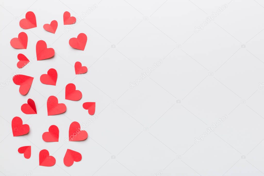 Valentine day background with red hearts, top view with copy space.