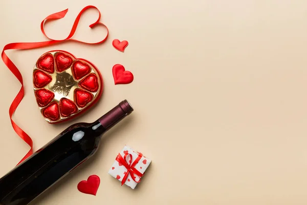 Bottle Red Wine Colored Background Valentine Day Gift Chocolate Heart — Stock Photo, Image