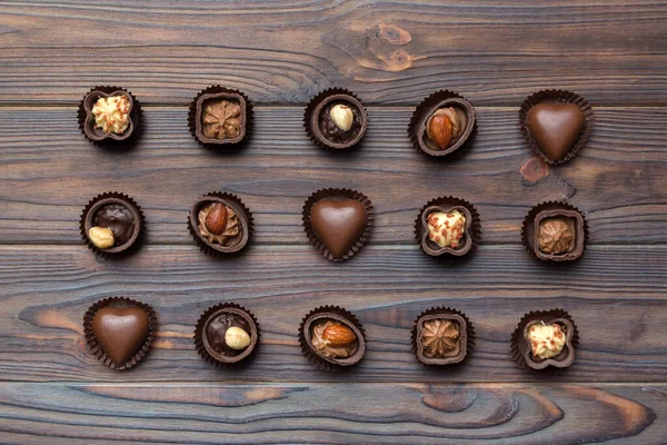 Diferentes Tipos Chocolates Mesa Colorida Close Vista Superior Leigos Planos — Fotografia de Stock