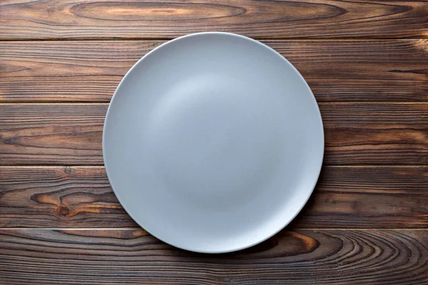 Top View Empty Grey Plate Wooden Background Empty Space Your — Stock Photo, Image