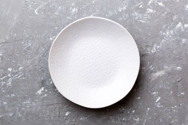 Beton zemin üzerinde boş ışık plakası üst görünümü. Tasarımın için boş boşluk.