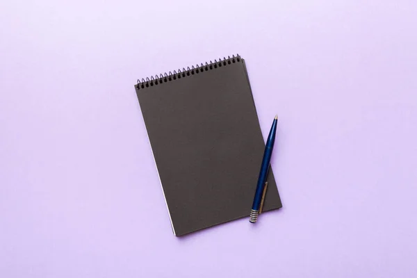 School Notebook Colored Background Spiral Black Notepad Table Top View — 图库照片