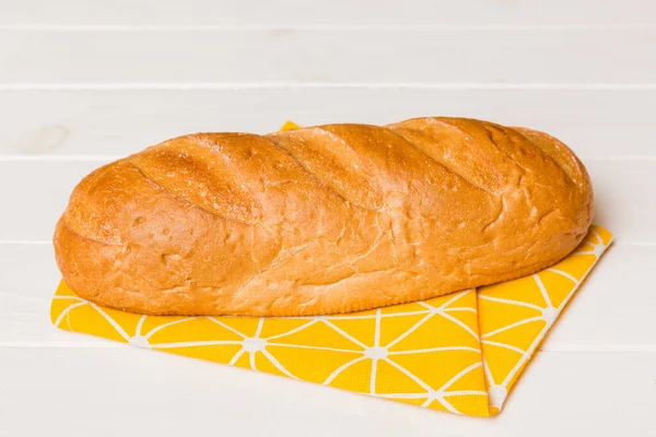 Fresh homemade crisp bread on napkin, top view. Healthy unleavened bread. French bread. Top view Bakery products.