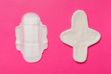 set of colorful bright reusable menstrual pads. zero waste woman periods concept top view with copy space.