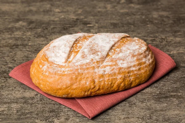 Fresh homemade crisp bread on napkin, top view. Healthy unleavened bread. French bread. Top view Bakery products.