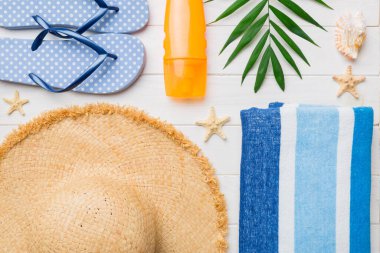 Summer vacation concept flat lay. beach accessories and towel top view. Space for text. travel concept.