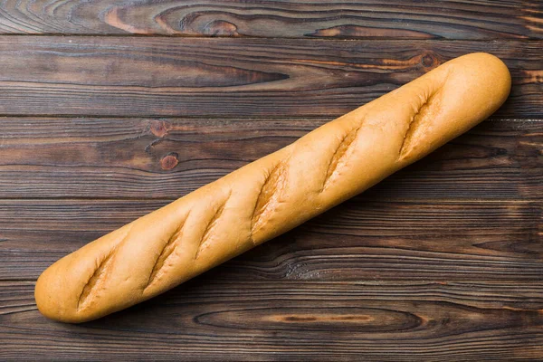 Μινιμαλιστική Γαλλική Μπαγκέτα Έγχρωμο Φόντο Φρέσκο Ψωμί Φόντο Κορυφαία Προβολή — Φωτογραφία Αρχείου