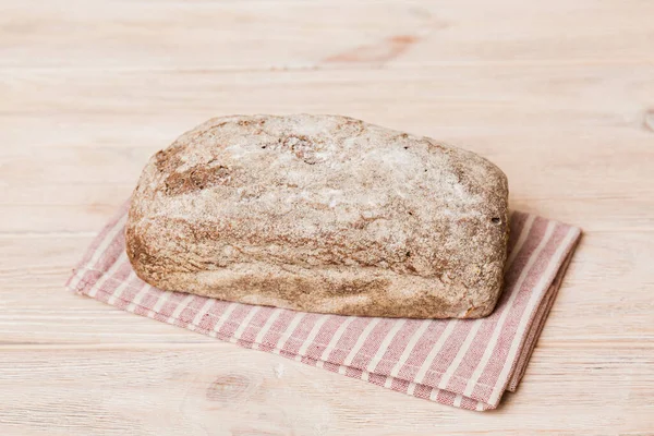 Fresh homemade crisp bread on napkin, top view. Healthy unleavened bread. French bread. Top view Bakery products.