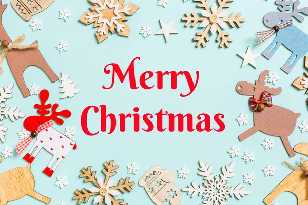 Merry Christmas Text Top View Holiday Decorations Toys Blue Background — Foto de Stock