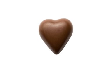 Üst görünüm çikolatalı şekerler beyaz arka planda izole edilmiş kırpma yolu ve tam derinlik. Düz yatıyordu.