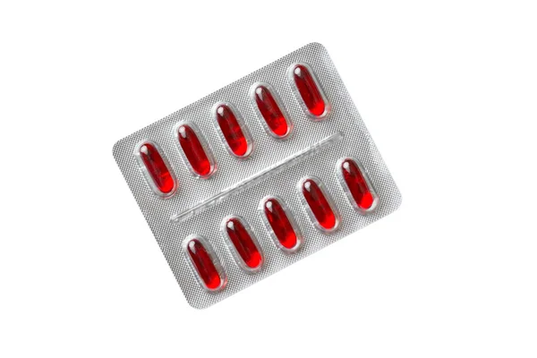 Beyaz Arka Planda Izole Edilmiş Kırmızı Haplar Tabletler Masaya Eczane — Stok fotoğraf