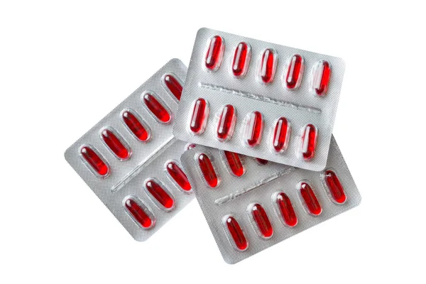 Group Blister Red Capsule Pills Isolated White Background Top View — 图库照片