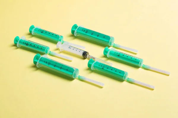 Top View Different Syringes Yellow Background Medical Injection Concept Copy — kuvapankkivalokuva