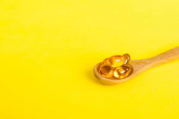 Vitamin Omega Capsules Spoon Colored Background Pills Served Healthy Meal — Stockfoto