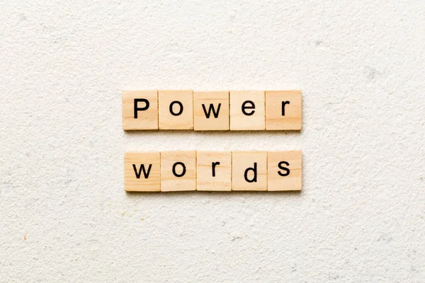 POWER WORDS word written on wood block. POWER WORDS text on table, concept.