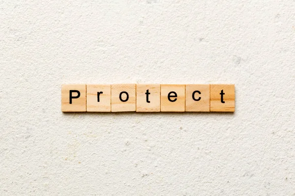 Schutz Wort Auf Holzblock Geschrieben Protect Text Auf Zementtisch Für — Stockfoto