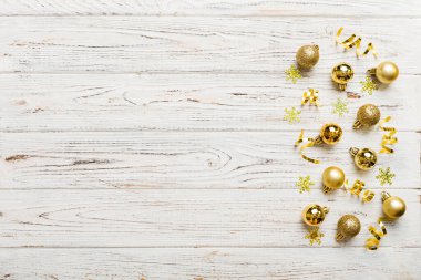 Christmas composition. a pattern of christmas balls on colored background. Flat lay, top view New year decor.