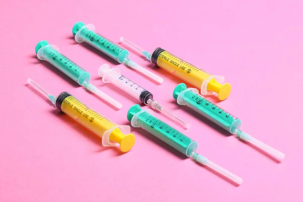 Top View Different Syringes Pink Background Medical Injection Concept Copy — Foto de Stock