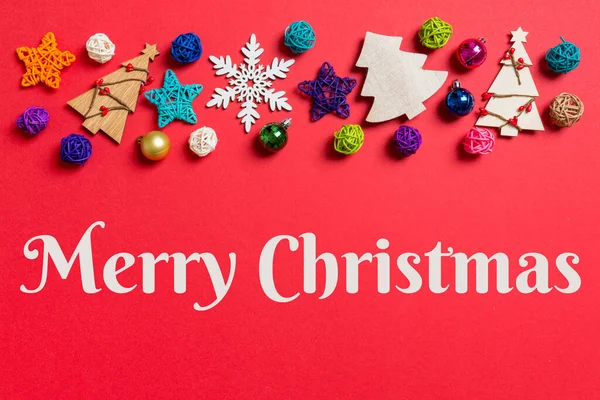 Merry Christmas Text Top View Holiday Decorations Toys Red Background — Foto de Stock