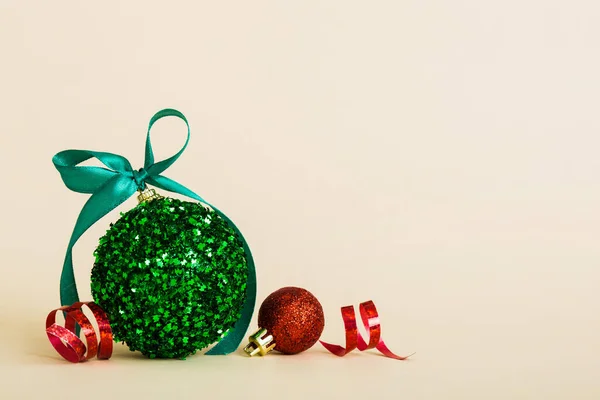 Christmas Ball Colored Background Decoration Bauble Ribbon Bow Copy Space Stock Picture