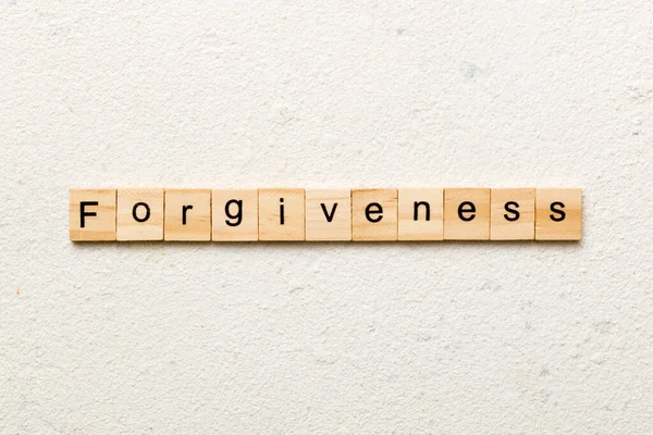Słowo Przebaczenia Napisane Drewnianym Bloku Tekst Przebaczenia Stole Koncepcja — Zdjęcie stockowe