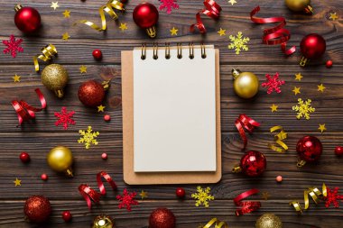 Christmas blank greeting card mock-up scene. Creative layout made of Christmas tree branches and paper card note. Flat lay. Nature New Year concept.