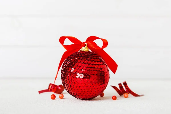 Christmas Ball Colored Background Decoration Bauble Ribbon Bow Copy Space — Stockfoto