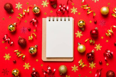 Christmas blank greeting card mock-up scene. Creative layout made of Christmas tree branches and paper card note. Flat lay. Nature New Year concept.