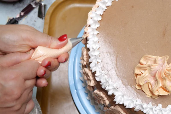 Woman Pastry Chef Pastry Bag Her Hands Squeezes Cream Cake — Stock Photo, Image