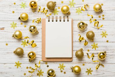 Christmas blank greeting card mock-up scene. Creative layout made of Christmas tree branches and paper card note. Flat lay. Nature New Year concept.