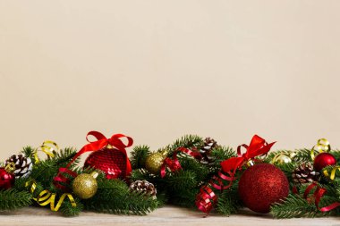 New Year Christmas tree toy, branches of a christmas tree, New Year decorations on a colored background.