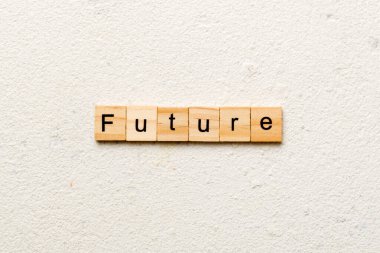 Tahta blokta yazılı gelecek kelime. Çimento masasında gelecek metni desing, konsept.