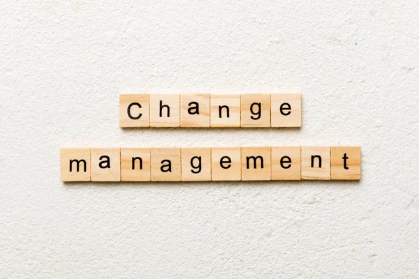 change management word written on wood block. change management text on table, concept.