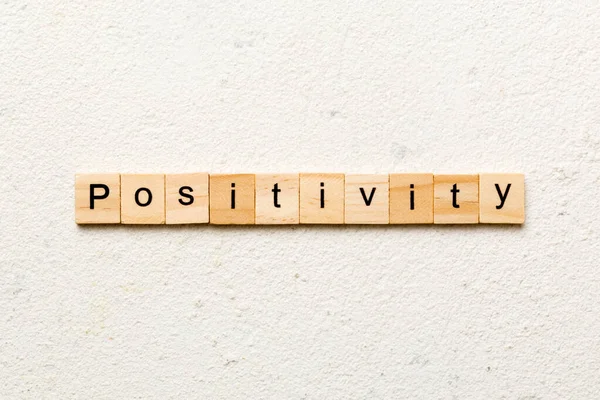 Positivity Word Written Wood Block Positivity Text Cement Table Your — Stock Photo, Image