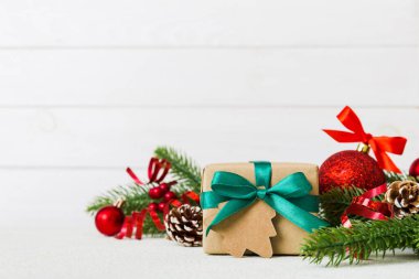 New Year Christmas tree toy, branches of a christmas tree, New Year decorations on a colored background.