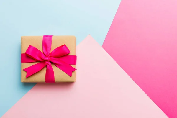 Holiday Paper Present Tied Pink Ribbon Bow Top View Copy — Stock fotografie