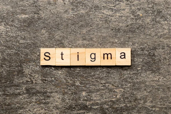 Stigmatické Slovo Napsané Dřevěných Tvárnicích Stigma Text Stole Koncept — Stock fotografie