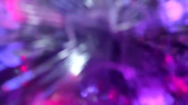 Göz kırpan parlak, soyut renkli 4K video bokeh arkaplan. Renkli ve farklı renklerde. Bulanık tatil ışıkları.