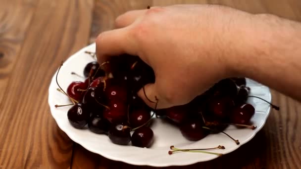 Plate Ripe Fresh Tasty Cherries Man Takes Lot Ripe Tasty — Vídeos de Stock