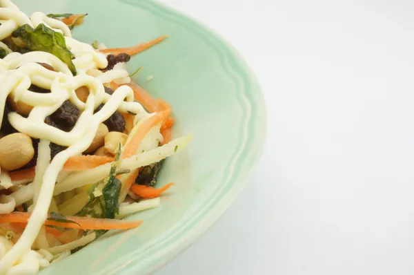 Salad with tomato raisins carrot and mayonnaise — Stock Photo, Image