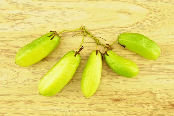 Fondo de madera Averrhoa bilimbi — Foto de Stock