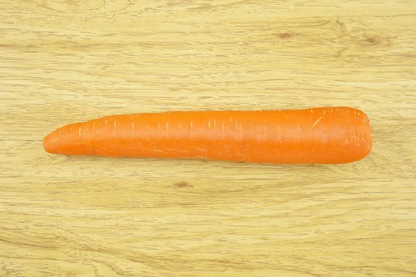 Carrot wood background — Stock Photo, Image