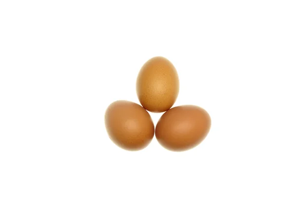 Eggs put as triangle isolated — Stock Photo, Image