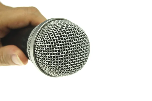 Hand hold black and silver microphone isolated — Stock Photo, Image